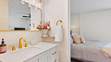 Hair dryer, towels, soap, shampoo