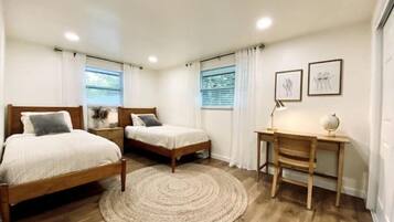 2 bedrooms, desk, iron/ironing board, travel crib