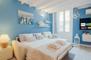 1 chambre, fer et planche à repasser, accès Internet, draps fournis