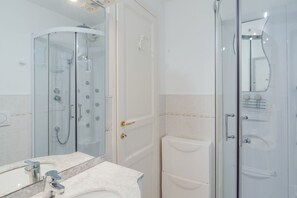 Shower, jetted tub, hair dryer, bidet
