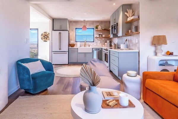 One level 900 square foot home with stunning views, open-concept living and ample lighting.