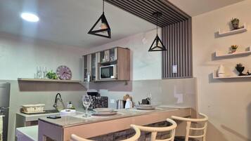 Fridge, microwave, stovetop, electric kettle