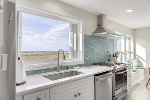 Fridge, microwave, oven, stovetop - Beach Life-Ruff E Nuff - Coastal Realty Group (Grand Isle)