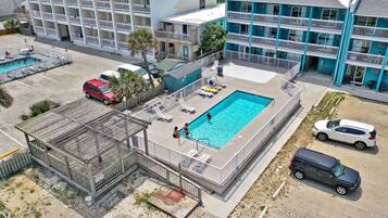 Outdoor pool, open 8:00 AM to 8:00 PM, pool umbrellas, sun loungers