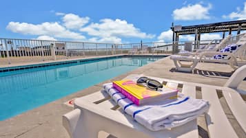 Outdoor pool, open 8:00 AM to 8:00 PM, pool umbrellas, sun loungers