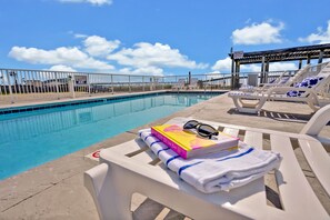 Outdoor pool, open 8:00 AM to 8:00 PM, pool umbrellas, sun loungers - Admiral's Quarter (Kure Beach)