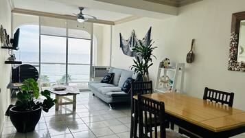 City Apartment | Living area | 50-inch Smart TV with digital channels, TV