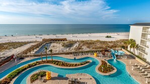 A resort with a swimming pool, beach access, and a view of the ocean. - Phoenix Gulf Towers 802 | Beachfront | Spectacular Gulf Views | Pools | My Beach Getaways (Orange Beach)