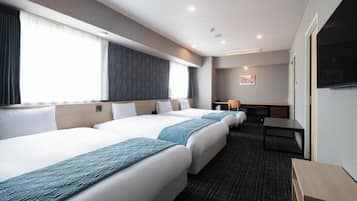 Deluxe Twin Room (With 2 Extra Beds), Non Smoking | Down comforters, desk, laptop workspace, iron/ironing board