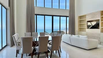 Deluxe Condo, Partial Sea View | Living area