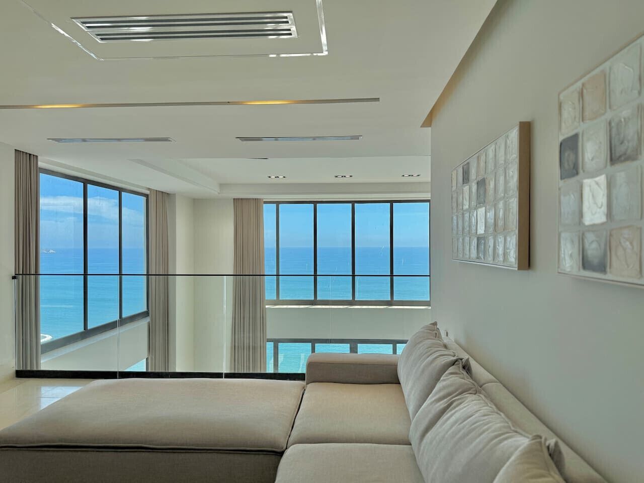 Deluxe Condo, Partial Sea View | Living area