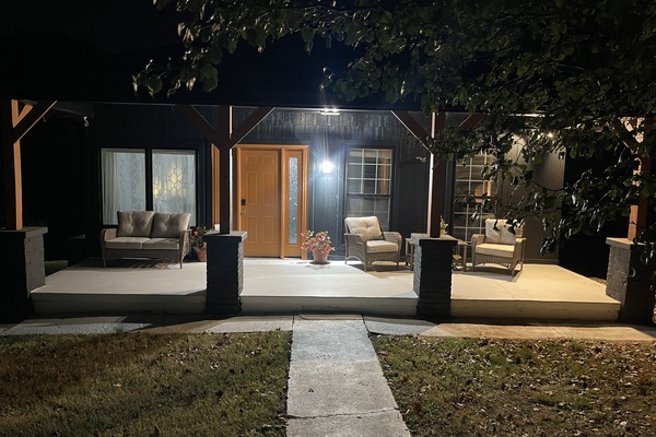 Relax on the front porch on your vacation stay