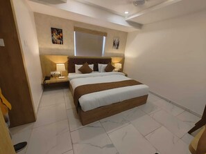 Habitación Deluxe doble | Tabla de planchar con plancha y wifi gratis