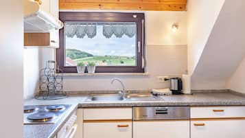 Kylskåp, ugn, spishäll och diskmaskin