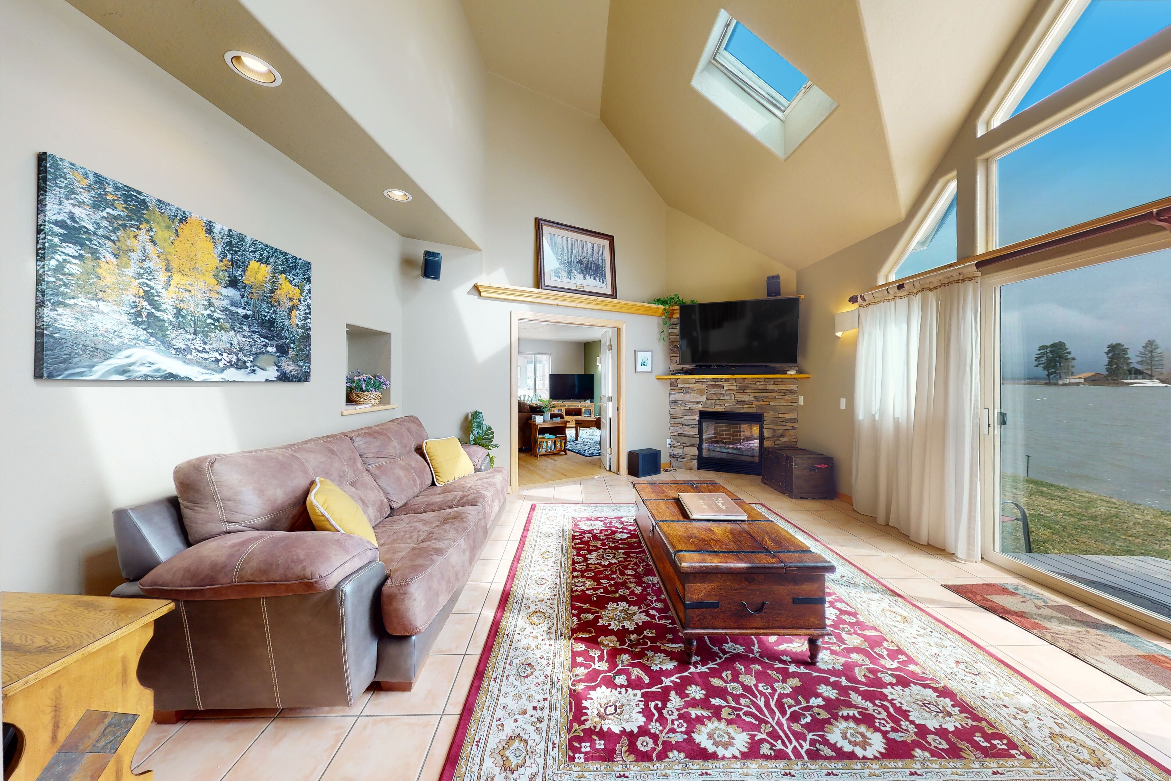 Stunning lake house w/ dock, firepit, grill, canoes, & fireplace - mtn views