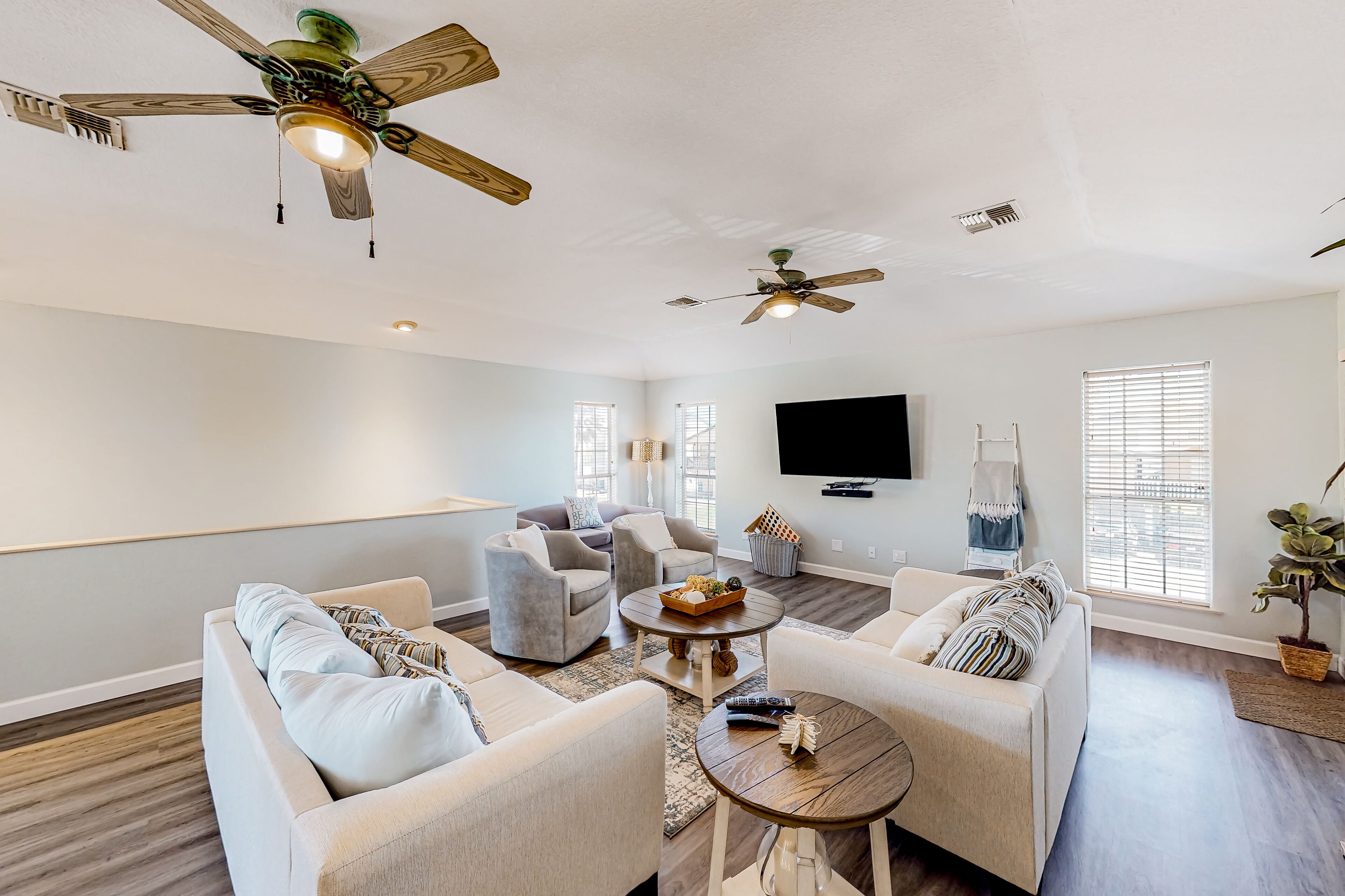 Sunny home half a block from the beach with pool, putting green & large patio