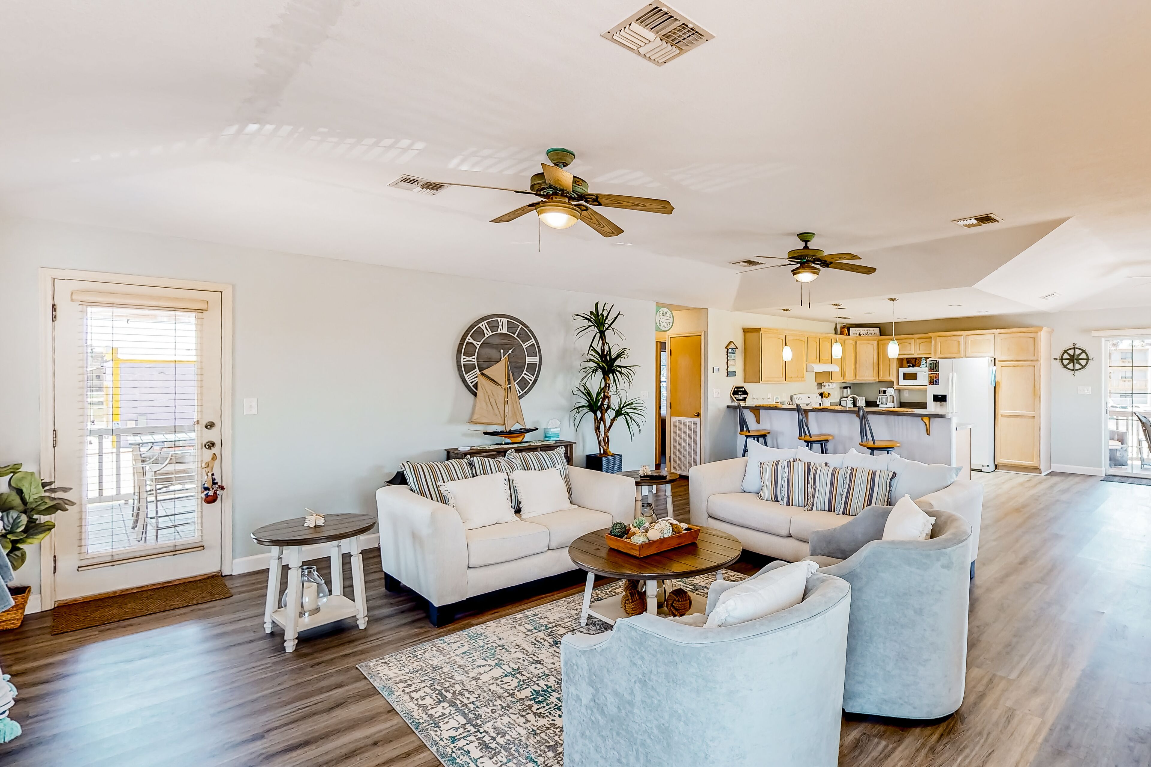 Sunny home half a block from the beach with pool, putting green & large patio