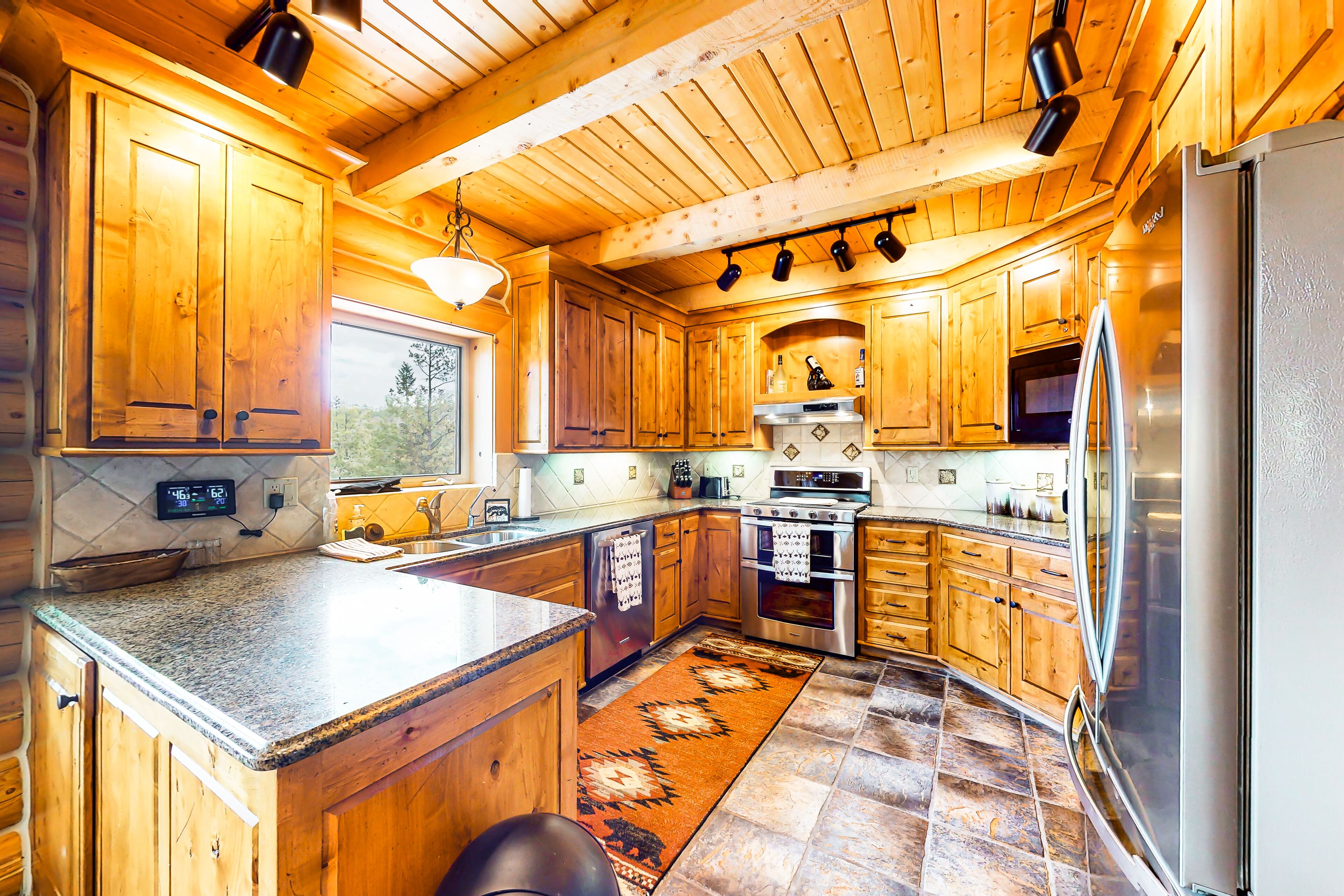 Stunning mountain view home with hot tub, fireplace, W/D, game room, & kitchen