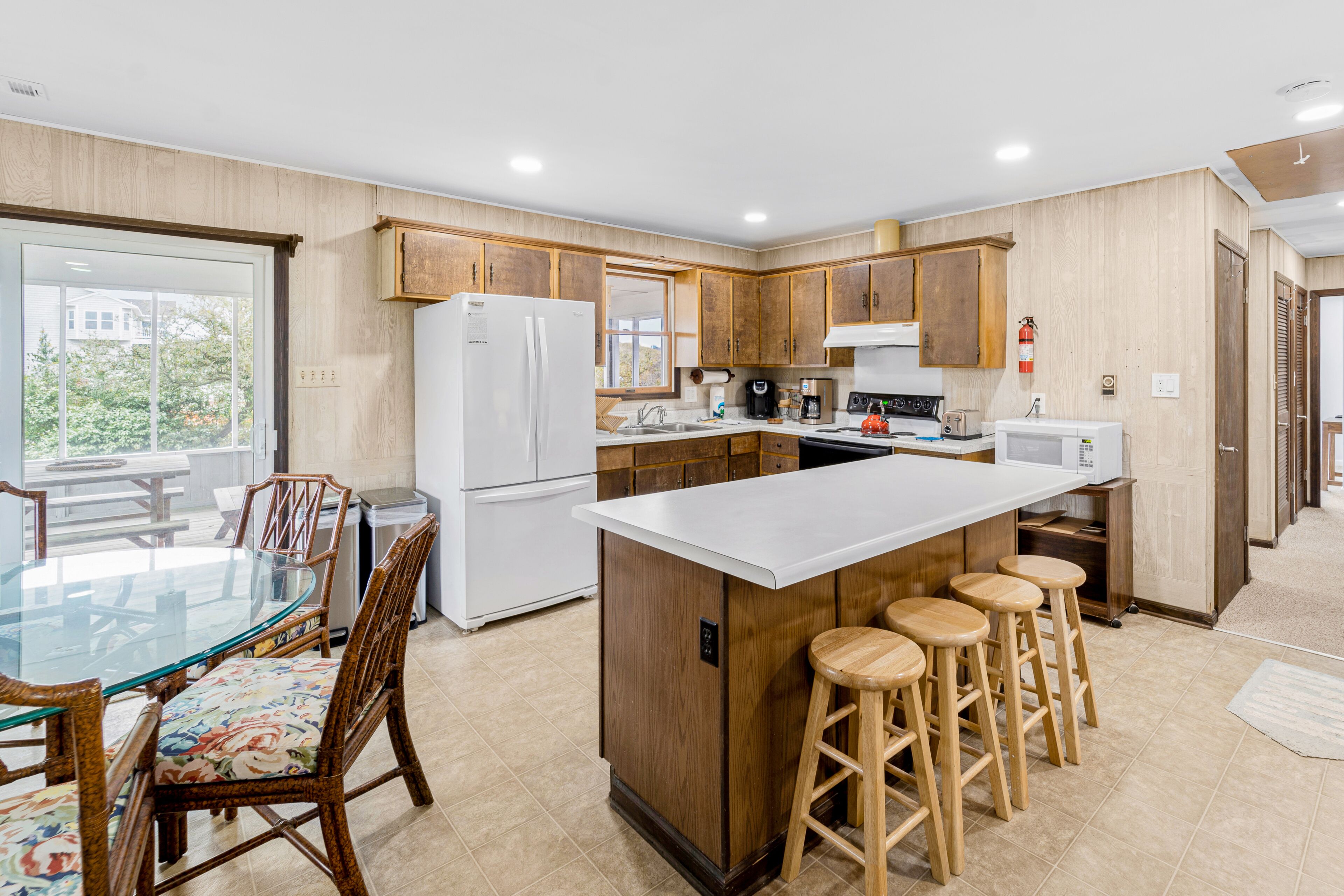 Dog-friendly home near beach with screened porch, fireplace, & outdoor shower