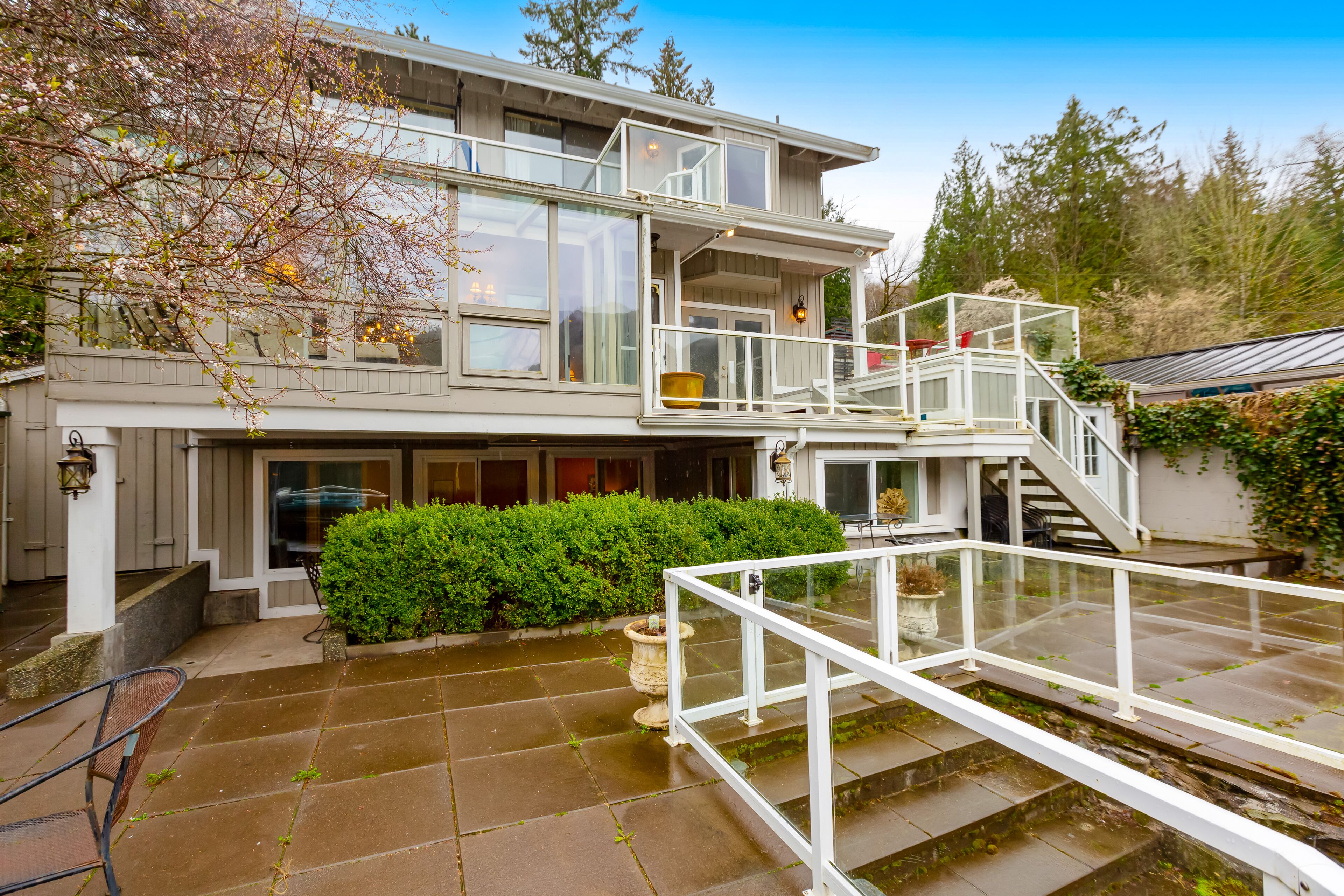 Lakefront home with stunning view, hot tub, dock, decks, firepit & rec room