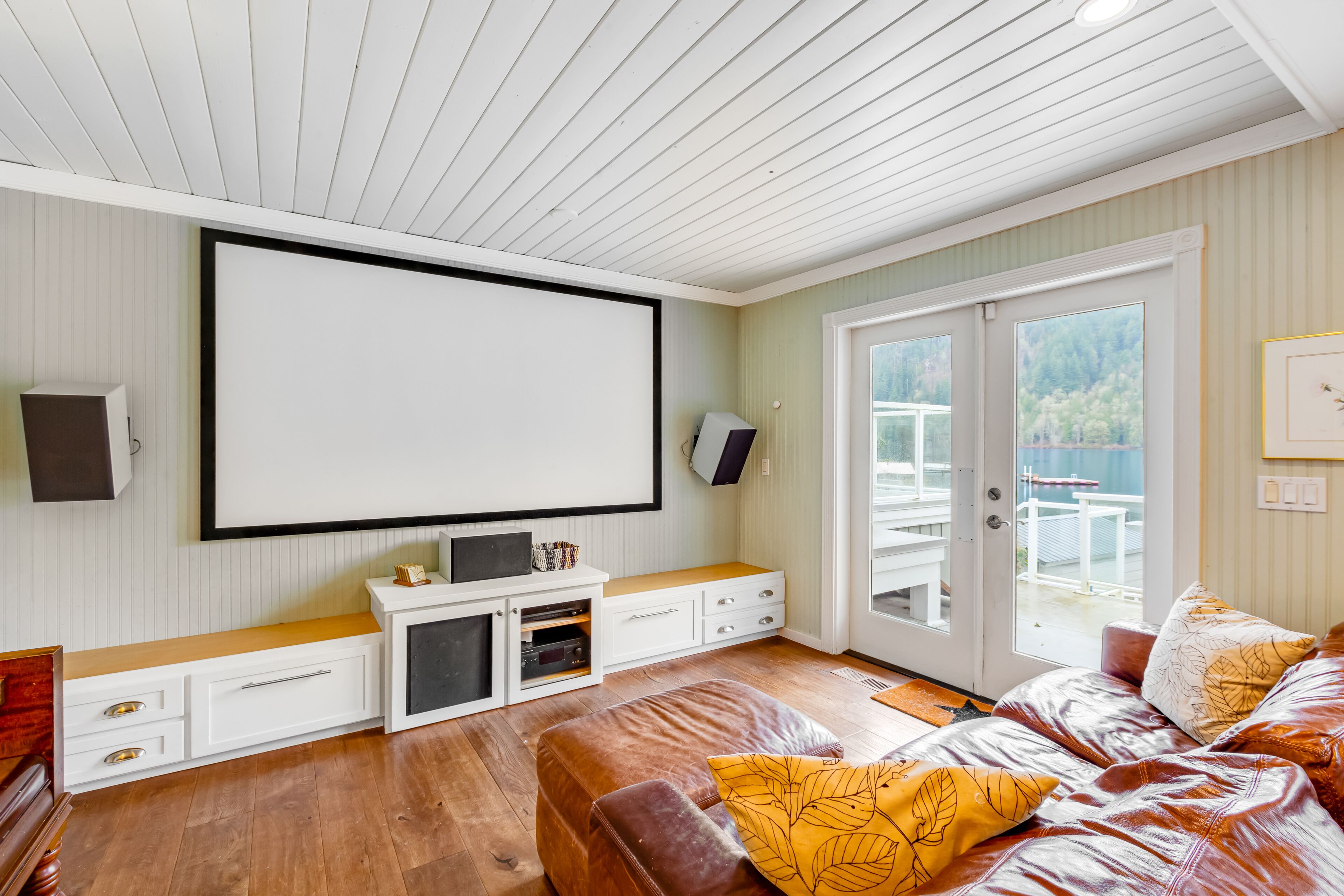 Lakefront home with stunning view, hot tub, dock, decks, firepit & rec room