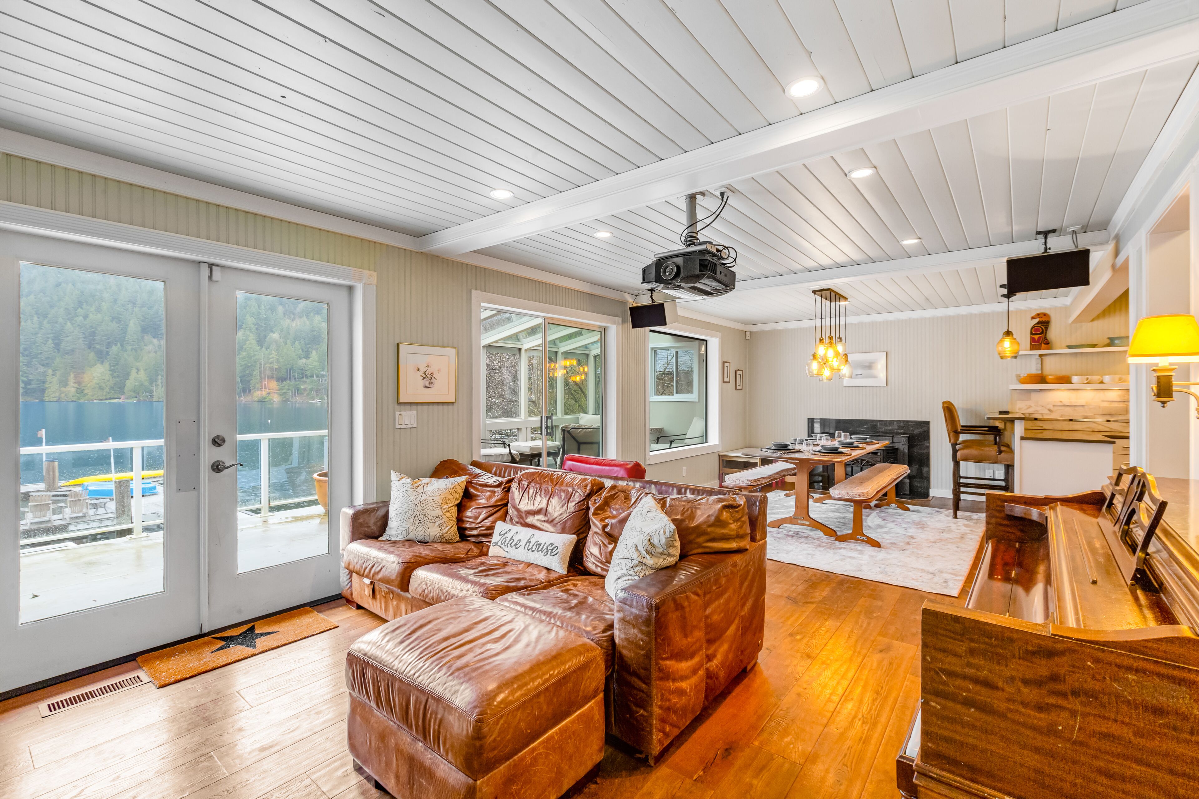 Lakefront home with stunning view, hot tub, dock, decks, firepit & rec room