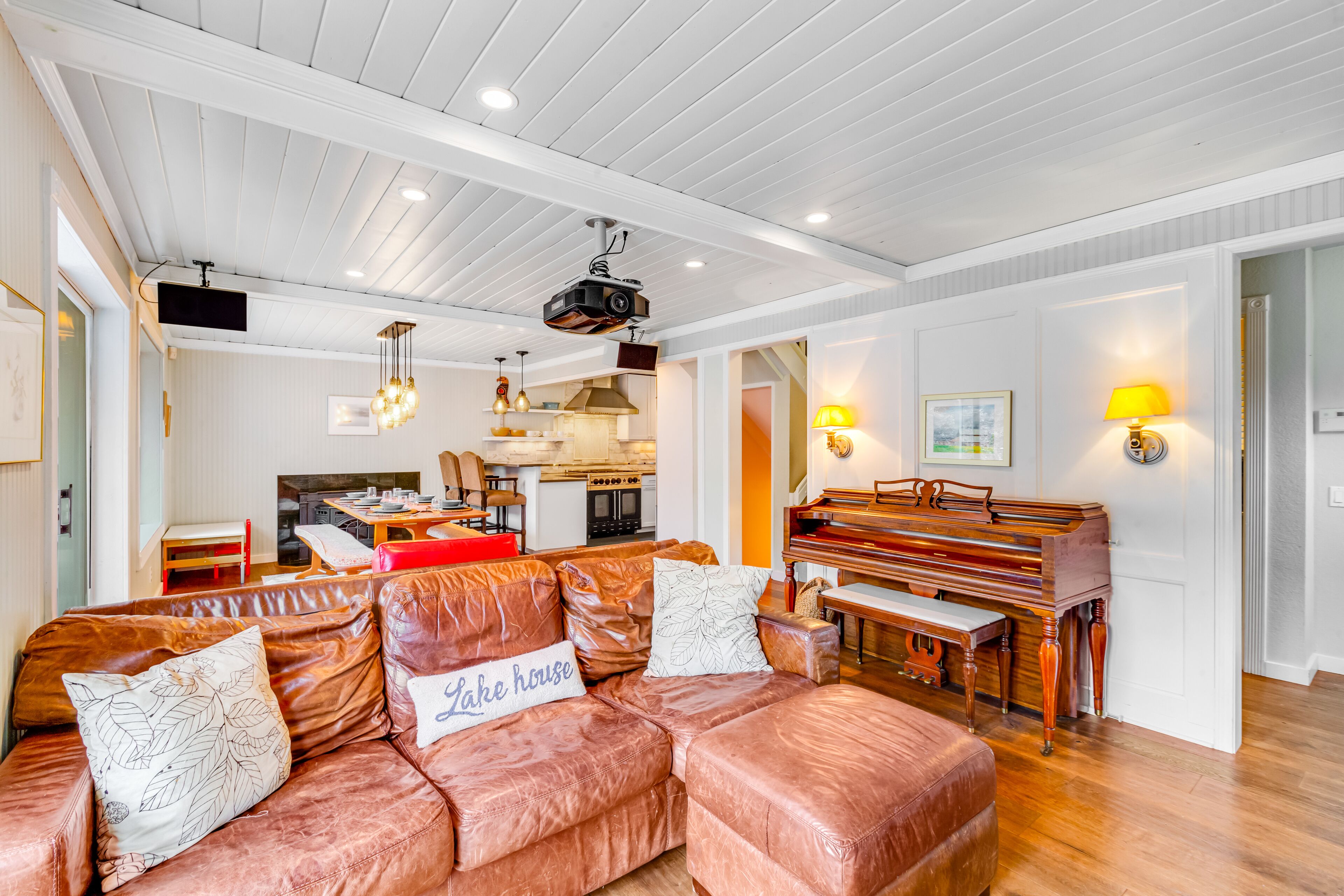 Lakefront home with stunning view, hot tub, dock, decks, firepit & rec room