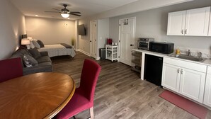 A compact living space with a dining area, kitchenette, and a bedroom. - Mid-term rental available - close to all attractions in the Greater Chattanooga and NW Georgia area (Chattanooga)