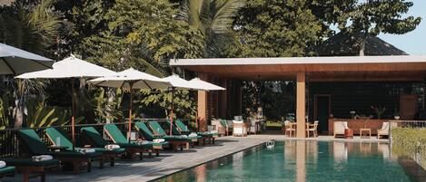 Outdoor pool, pool umbrellas, sun loungers