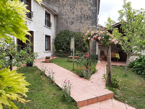 Charming 18th Century Gîte with Garden, Fireplace, and Modern Amenities