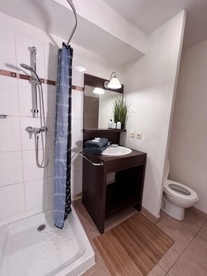 Hair dryer, towels, soap, toilet paper
