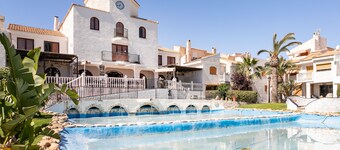 Holiday Home 'Casa en la playa con piscinas 297' with Shared Pool, Wi-Fi and Air Conditioning