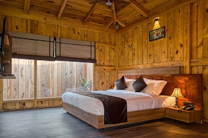 Super Deluxe Cottage. | Minibar, in-room safe, desk, blackout drapes - Pumpkin Hotels Corbett, Tusk N Wood (Ramnagar)