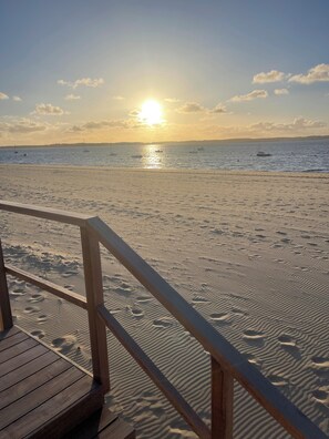 On the beach, sun loungers
