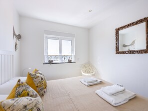 2 bedrooms, travel crib, WiFi, bed sheets