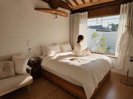 Habitación básica, bañera de hidromasaje | Sábanas de algodón egipcio y ropa de cama de alta calidad