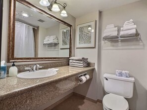 Bathtub, hair dryer, towels