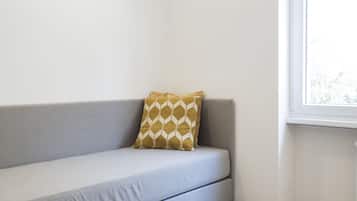 Deluxe Quadruple Room | Down comforters, memory foam beds, minibar, in-room safe