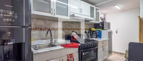 Fridge, microwave, oven, stovetop