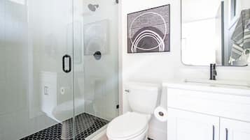 Bathtub, hair dryer, towels