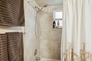 Hair dryer, towels, soap, shampoo