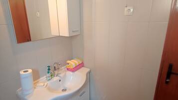 Shower, towels, soap, shampoo