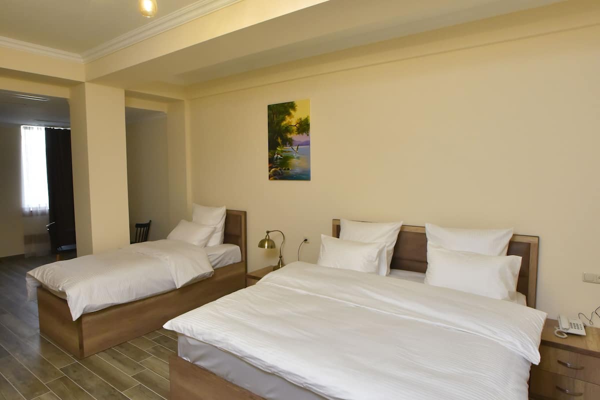 superior triple room | premium bedding, tempur-pedic beds, minibar, individually decorated