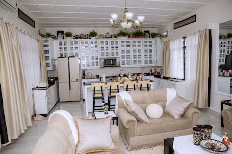 Luxury Double or Twin Room | Living area | 84-inch flat-screen TV with cable channels, TV, Netflix