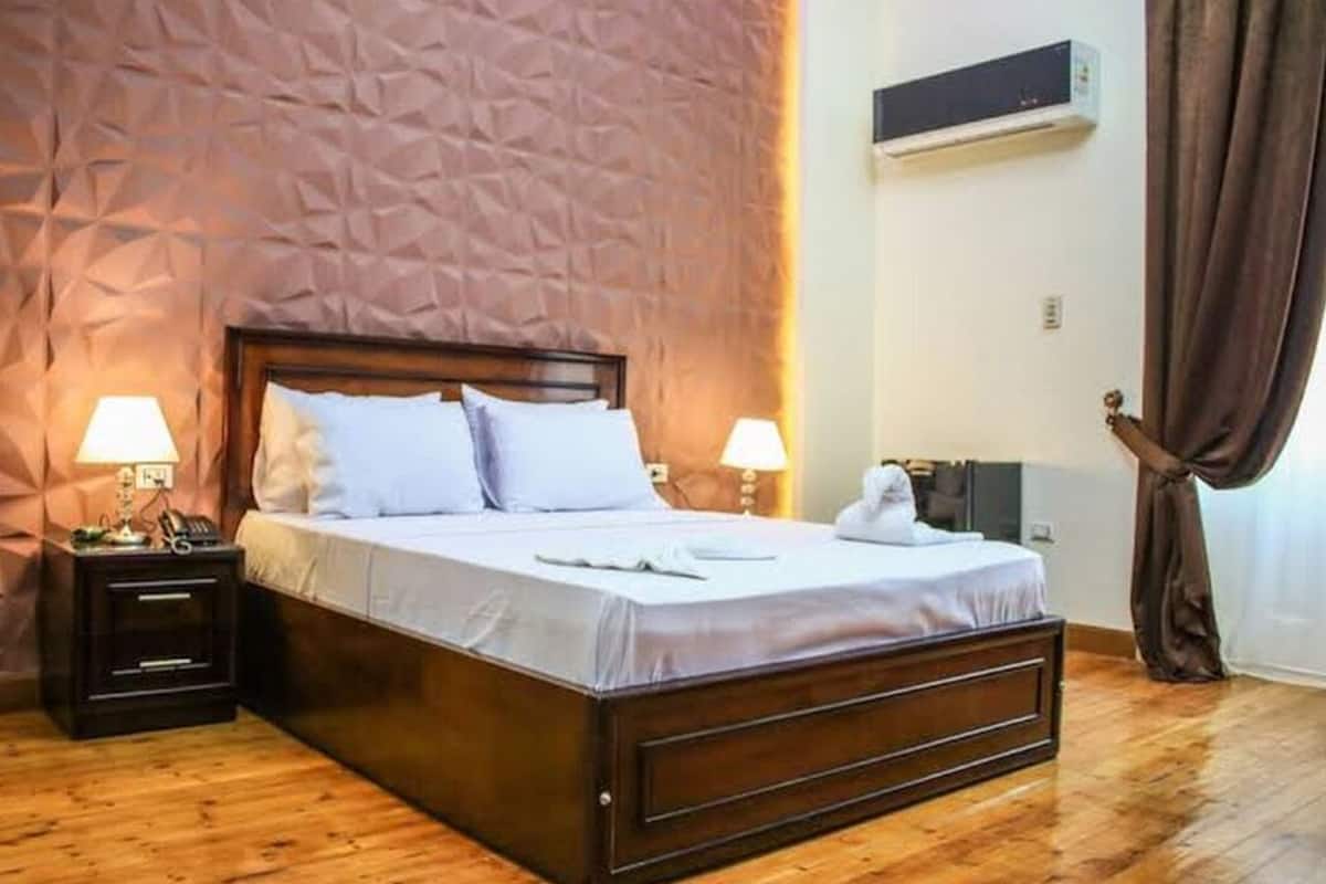 Egyptian cotton sheets, premium bedding, minibar, in-room safe