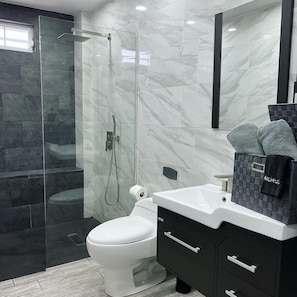 Shower, towels, soap, shampoo