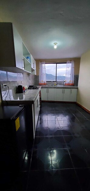 Appartamento Comfort | Cucina privata | Seggiolone