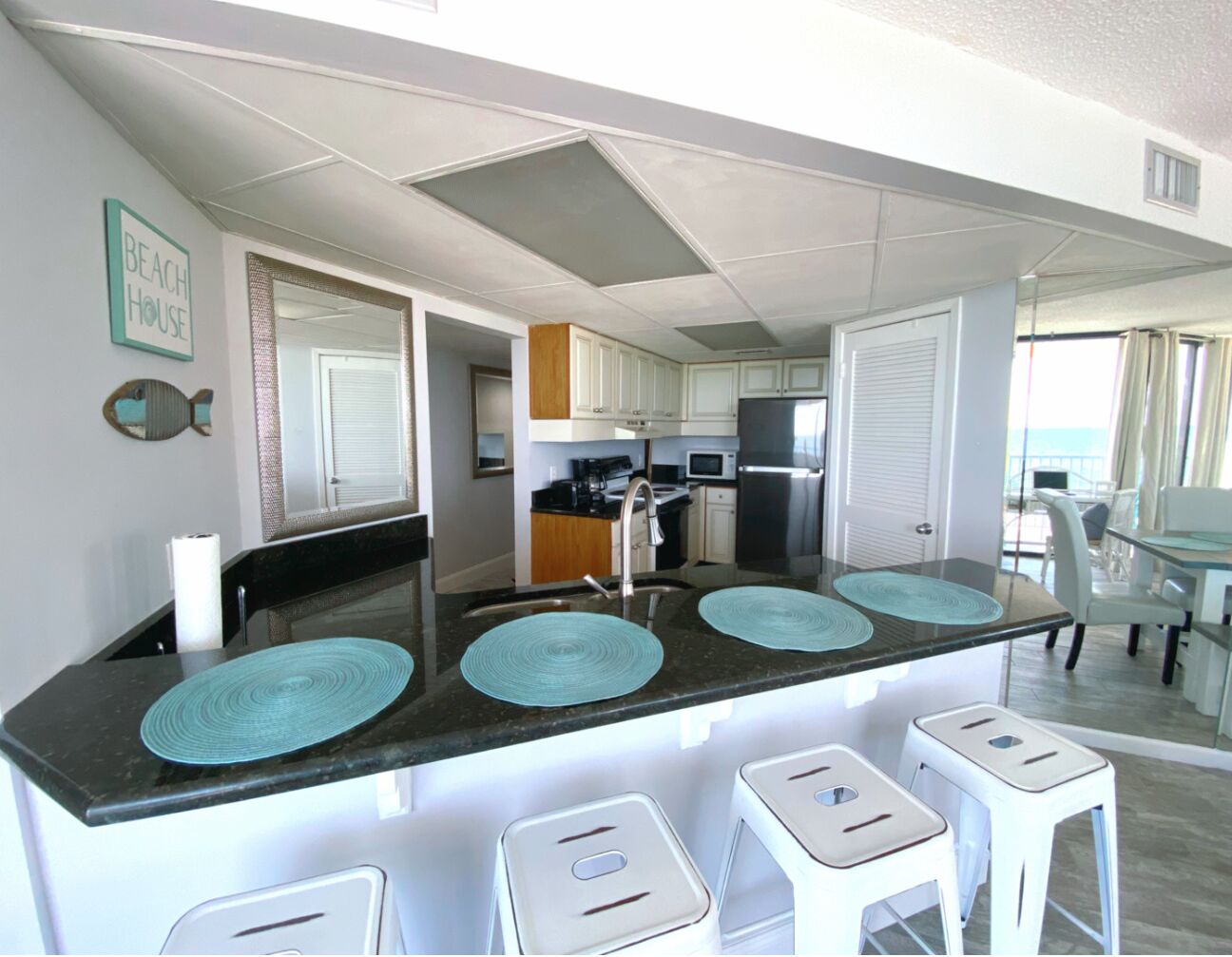 Apartment 406E | Private kitchen | Full-sized fridge, microwave, oven, stovetop