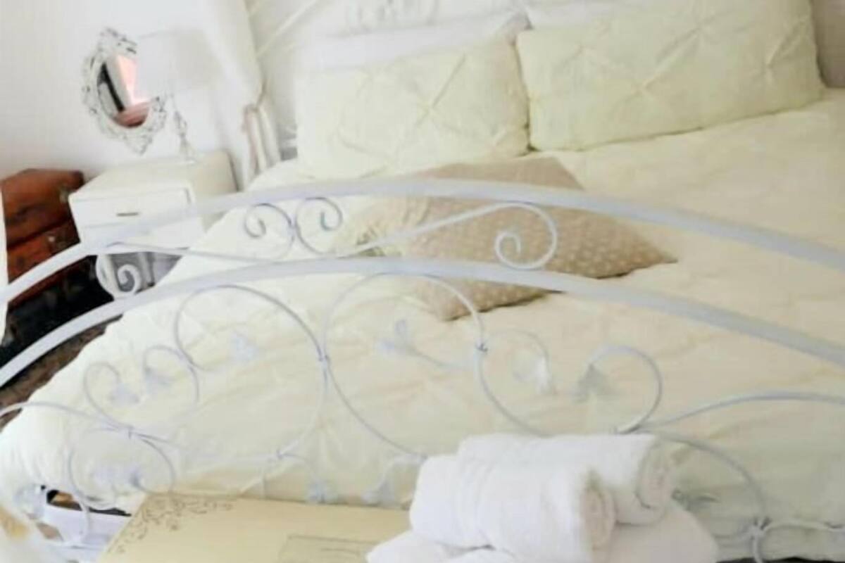 Minibar, desk, blackout curtains, iron/ironing board