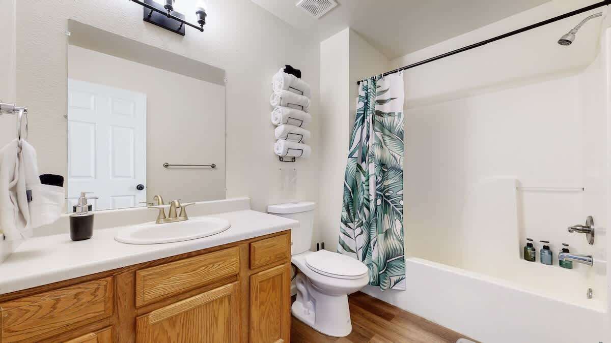 Bathtub, hair dryer, towels